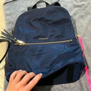 Navy blue medium size backpack bag purse